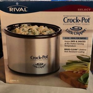 Brand new little crock pot. Opened but not used.